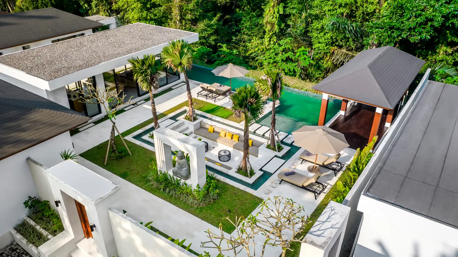 The house from above: the pool, the lounge and the gazebo among the trees